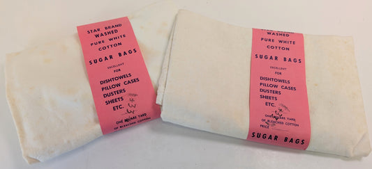 Four soft Canadian club coasters and two vintage sugar bags