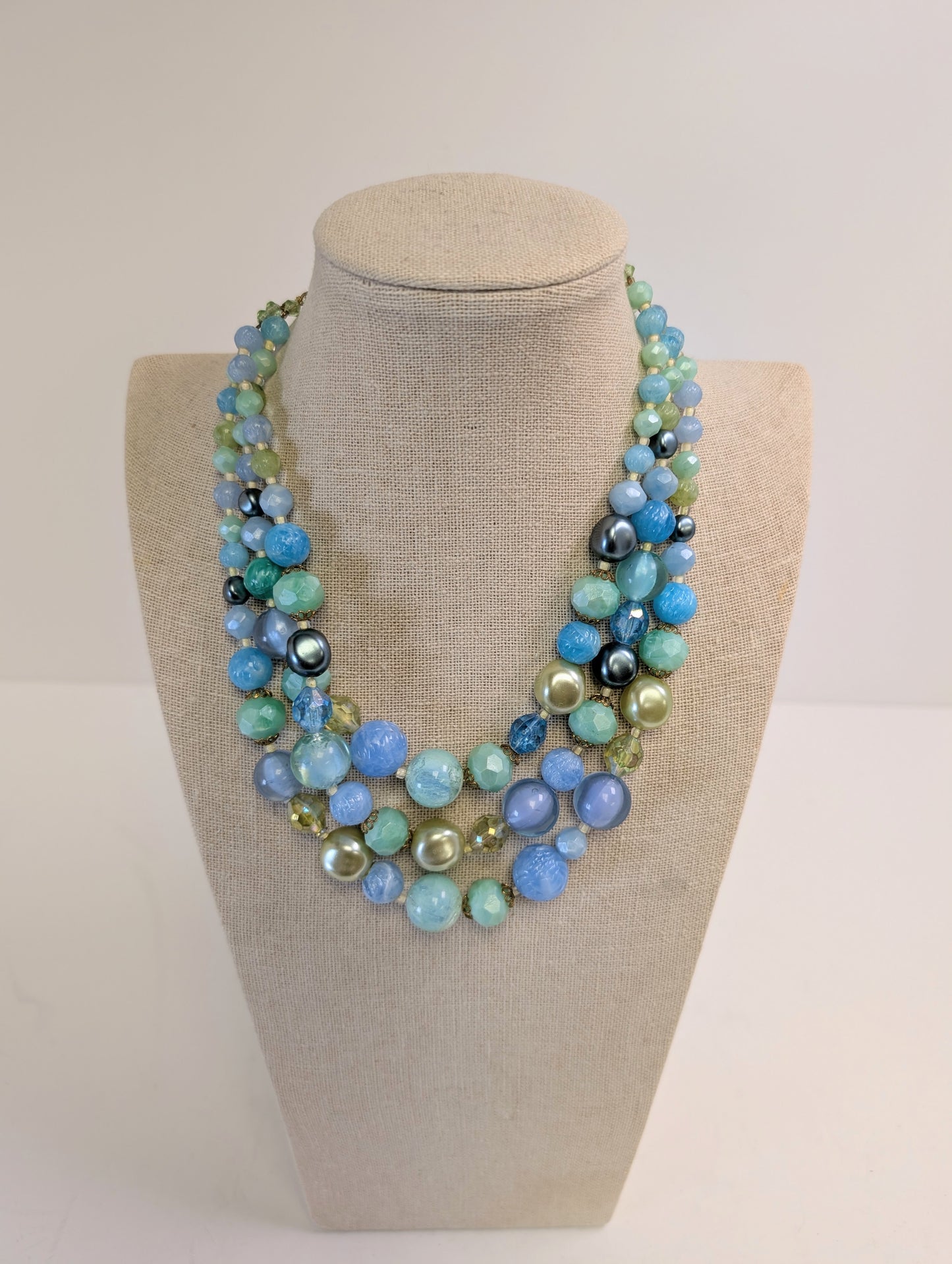 2 large multi strand gold toned necklaces