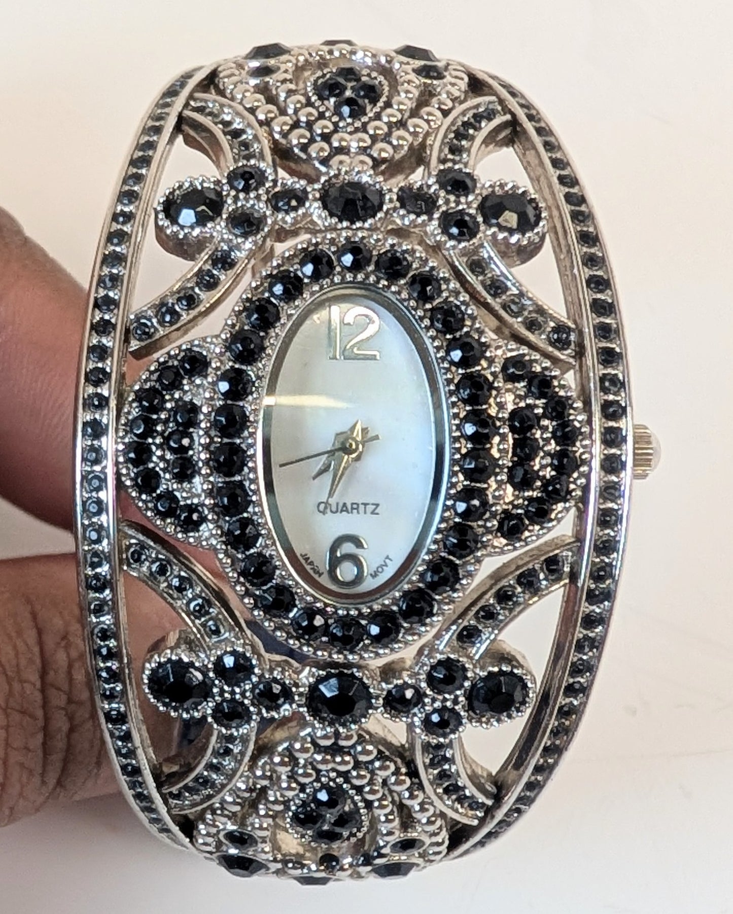 Black crystal silver women's watch.