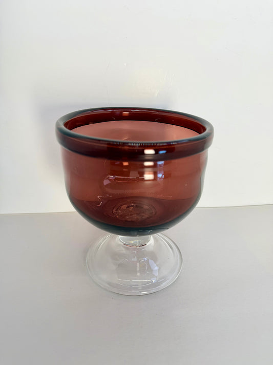 Glass carmine bowl on a leg