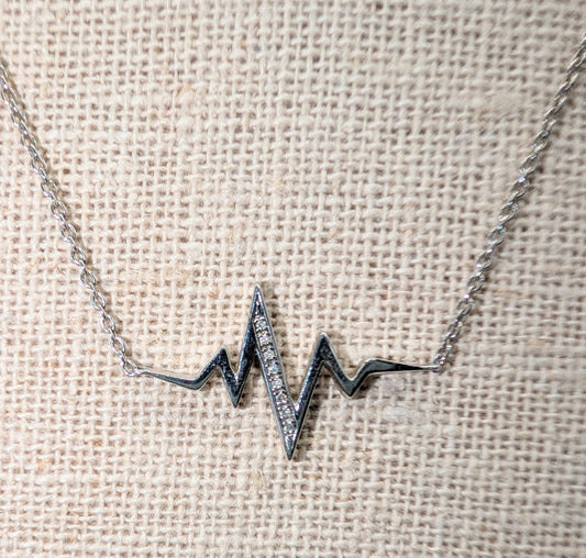Silver heartbeat necklace with diamonds