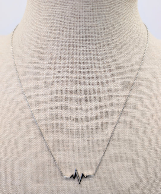 Silver heartbeat necklace with diamonds