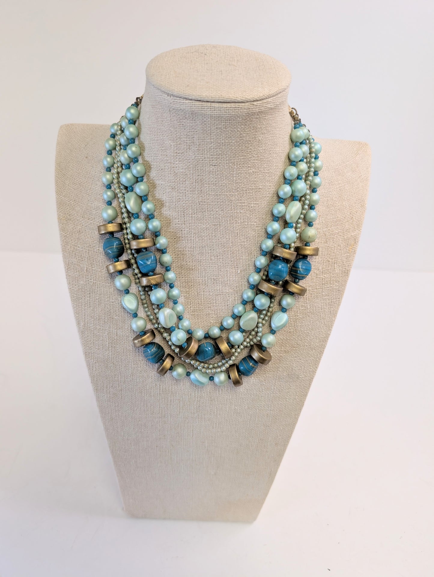 2 large multi strand gold toned necklaces