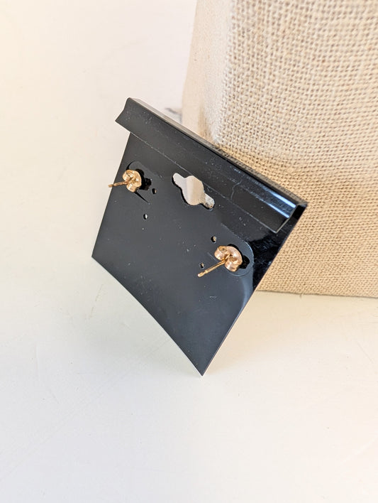 Sterling silver earrings with white and green gemstonea