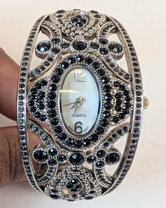 Black crystal silver women's watch.